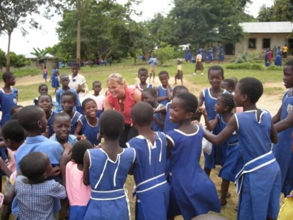 Ghana TeachingPartipant And Students In The Playground 